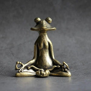 Incensário Budista, Sapo da Meditação, Peça Decorativa Budista, Bronze de Qualidade, Espiritualidade em Casa, Incensário Artesanal, Transformação e Renovação, Prática Meditativa, Detalhes Encantadores, Tamanho Compacto, Energia Positiva, Atmosfera Serena, Símbolo de Sorte, Espaço Zen, Arte Budista, Elemento Decorativo Espiritual, Incensário de Bronze, Meditação Tranquila, Prática Espiritual, Acessório Zen, Design Sapo.