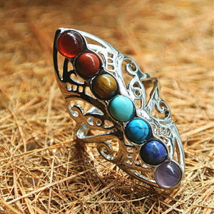 equilíbrio, paz interior, anel ajustável, chakras, harmonia espiritual, joia esotérica, liga de zinco, prata banhada, energias positivas, equilíbrio energético, sete chakras, revitalização espiritual, bem-estar, terapia de pedras, conexão espiritual, jóias espirituais, acessório ajustável, presente esotérico, joia terapêutica, alinhamento energético