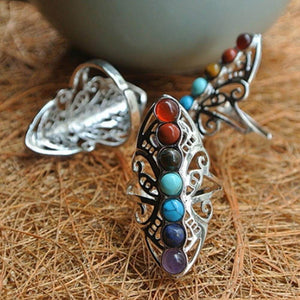 equilíbrio, paz interior, anel ajustável, chakras, harmonia espiritual, joia esotérica, liga de zinco, prata banhada, energias positivas, equilíbrio energético, sete chakras, revitalização espiritual, bem-estar, terapia de pedras, conexão espiritual, jóias espirituais, acessório ajustável, presente esotérico, joia terapêutica, alinhamento energético
