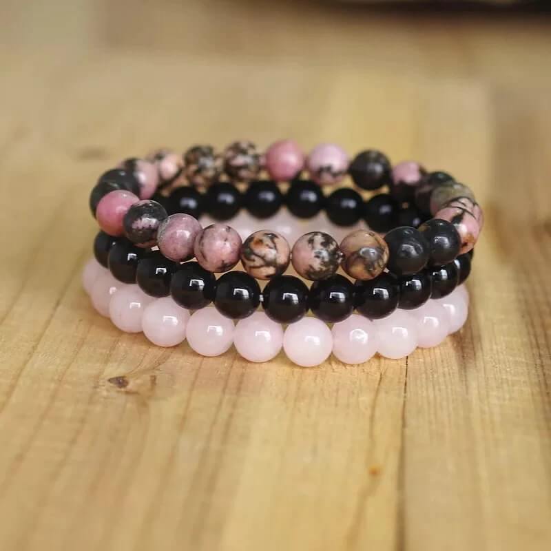3 Pulseiras de Pedras Naturais Rodonita, Quatzo Rosa e ônix. Amor, Equilíbrio Energético e Elevação da Sabedoria