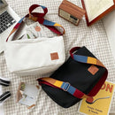 Bolsa Harmonia Cromática, Bolsa Transversal, Estilo e Praticidade, Bolsa Compacta, Design Slim, Alça Ajustável, Versatilidade, Lona Durável, Moda Diária, Conforto Elegante, Organização Moderna, Pertences Seguros, Visual Contemporâneo, Bolsa para Todas as Ocasiões, Estilo de Vida Agitado, Companheira Versátil, Moda Atual, Tendência Urbana, Acessório Essencial, Bolsa de Qualidade.