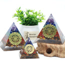 Pirâmide Orgonite, 7 Chakras, Pedras Naturais, Energia Positiva, Decoração Espiritual, Equilíbrio Energético, Símbolo de Ascensão, Orgonite Artesanal, Purificação de Energia, Ametista, Lápis Lazuli, Aventurina Verde, Jaspe Vermelho, Olho de Tigre, Terapia de Energia, Design Espiritual, Bem-Estar Holístico, Transformação Positiva, Energia Vital, Meditação Equilibrada.