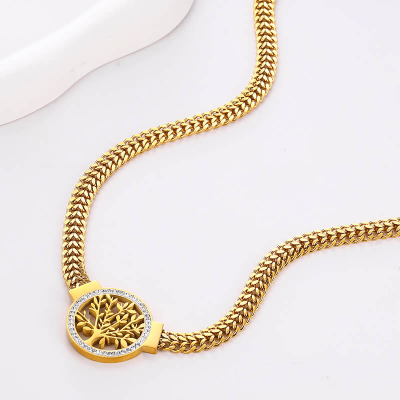 Colar dourado com pingente árvore da vida, acessório com significado espiritual e estético