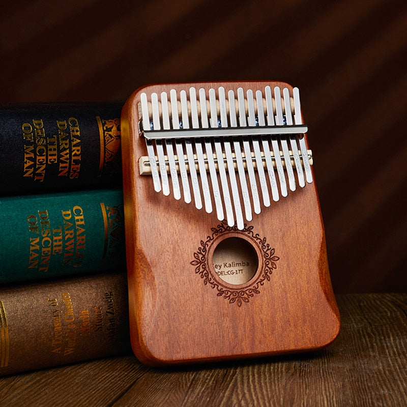 Kalimba de dedo, Kalimba portátil, Kalimba em madeira, Kalimba de mogno, Instrumento musical de dedo, Mini kalimba, Kalimba de bolso, Kalimba de madeira natural, Kalimba de tamanho compacto, Instrumento africano de dedo, Kalimba para iniciantes, Kalimba de dedo em mogno, Kalimba de qualidade, Kalimba artesanal, Kalimba de madeira maciça, Instrumento de música étnica, Kalimba fácil de transportar, Kalimba de dedo premium, Kalimba de bolso em mogno, Presente musical em madeira.