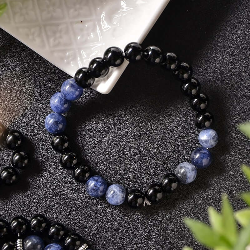 Japamala, Pulseira de Ônix, Lápis Lazuli, Espiritualidade, Estabilidade, Sabedoria, Meditação, Conexão Espiritual, Energias Positivas, Mala de Oração, Contas Naturais, Acessório Espiritual, Equilíbrio Energético, Proteção Energética, Ferramenta de Meditação, Japamala Artesanal, Cristais Naturais, Elevação Espiritual, Presente Espiritual, Acessório Terapêutico